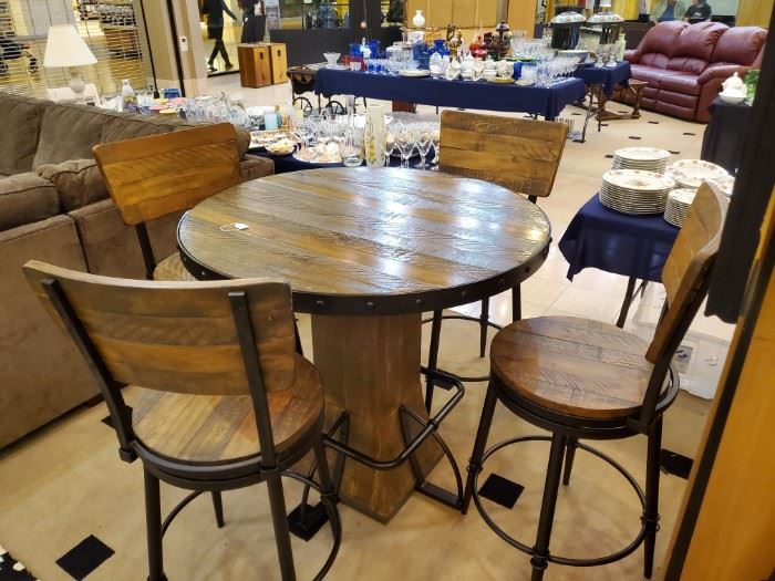 Counter height table and four chairs - Purchased only a few months ago for $1,400.  A great set!