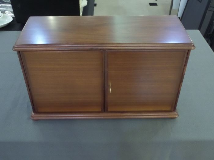 Dunhill Pipe Smokers Tobacco cabinet holds 12 pipes with two drawers & has locking doors.