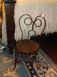 Vintage child's soda fountain chair and hand crocheted bedspread