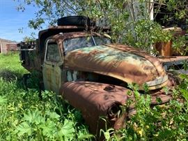 Cool old Chevrolet truck ready to be hauled off for someones dream project, or lawn art =)