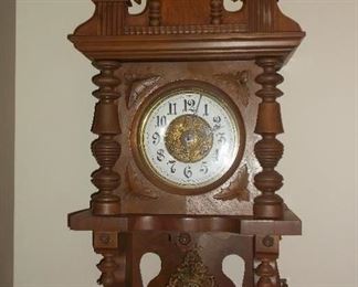 Open swinger antique German wall clock 