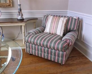 Large  upholstered chair and faux bambo console table