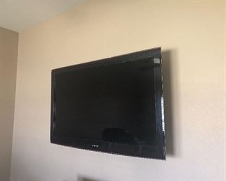 Wall-mounted flatscreen TV