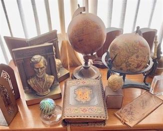 Vintage Desk Accessories: Worked Leather Book Cover, Blotter Cover; Small Replicas of Antique Globes; Arts and Crafts Copper Bookends; Mid Century Teak and Aluminum Bookends; Lincoln Brass Bookends; Paper Weights...