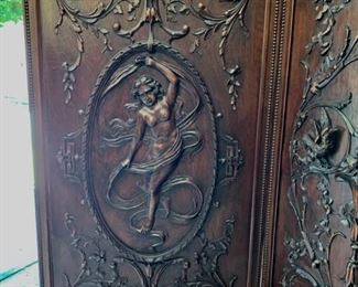 Detail of center Panel on Edwardian folding screen with relief carving and mirror panels