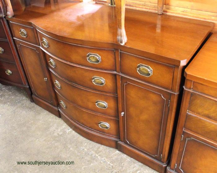 One of Several Mahogany Bow Front Sideboards
Located Inside – Auction Estimate $100-$300