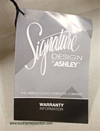 NEW Contemporary “Signature Design by Ashley” 5 Drawer White Washed High Chest
Located Inside – Auction Estimate $100-$300