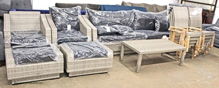 NEW 14 Piece Resin Wicker Style Patio Conversation Set with Self Storage for Cushions includes,
2 Chairs and Ottomans, Sofa, Coffee Table, 8 Chairs all with Cushions and Covers for Storing for your patio, porch, yard or garden!
Located Inside – Auction Estimate $500-$1000