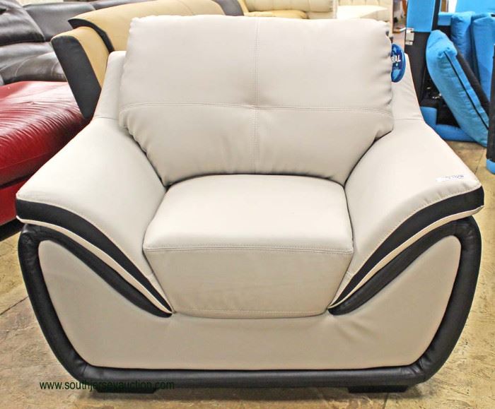 NEW Contemporary “Global” Leather Black and Grey Modern Design Sofa and Chair
Auction Estimate $400-$800 – Located Inside