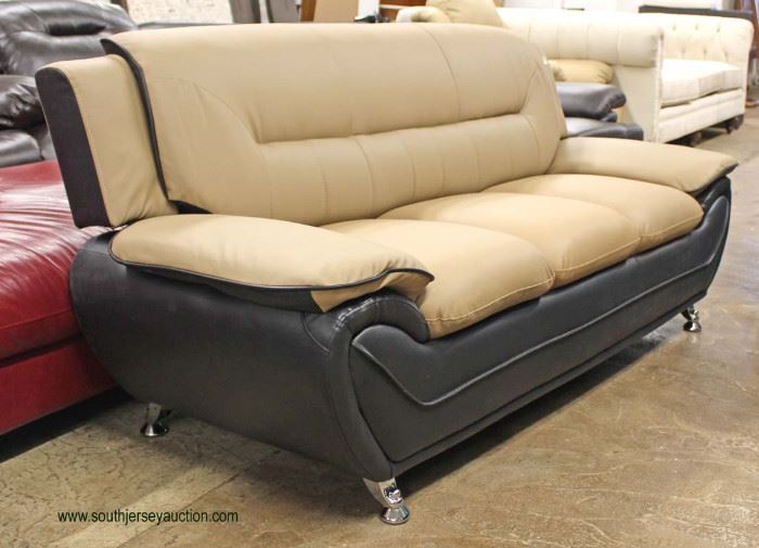 NEW Contemporary Leather Modern Design Tan and Black Sofa
Located Inside – Auction Estimate $300-$600