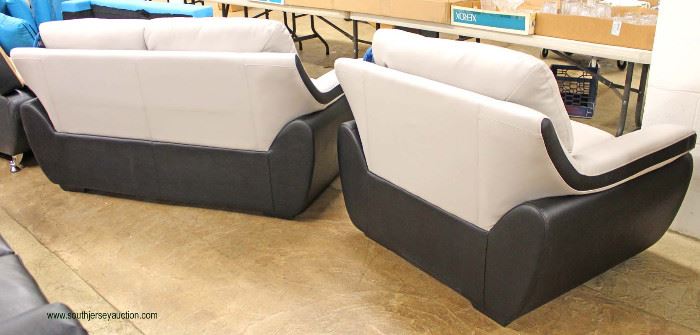 NEW Contemporary “Global” Leather Black and Grey Modern Design Sofa and Chair
Auction Estimate $400-$800 – Located Inside