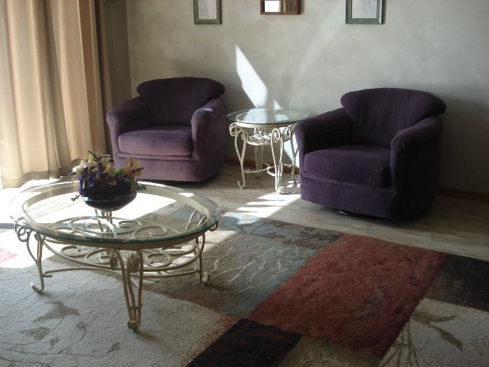 Purple Stuffed side chairs, Metal glass top end and coffee table, Large floor rug 