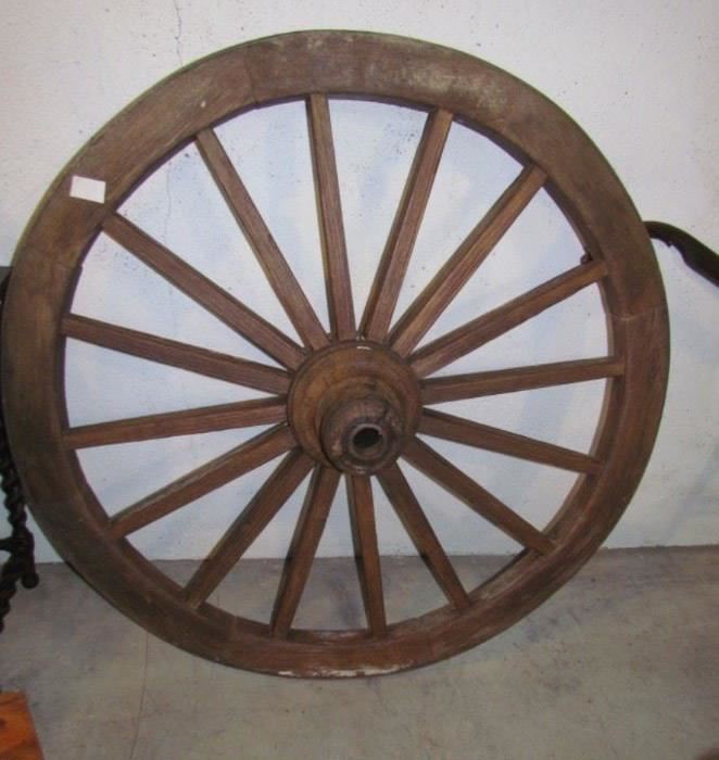 Large cart wheel, in good condition.