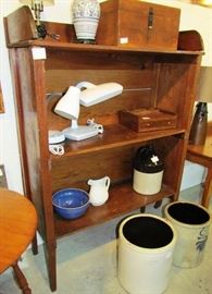 Early hand-made shelves, loaded with auction items