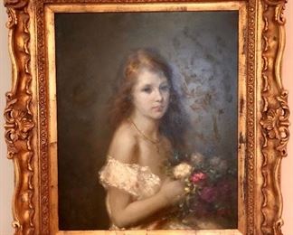 Beautifully framed oil painting of girl holding flowers