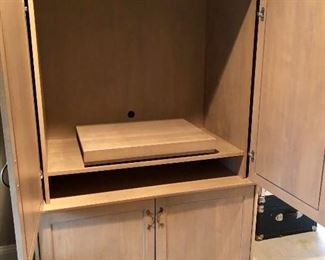 Have some imagination! Pull that TV stand out of there and install some shelving and voila! You have an instant closet!