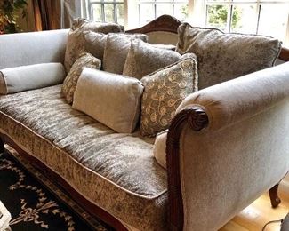 Plush Velvet Sofa with a million matching cushions. Super deep for extra coziness factor! Shimmering Silver in color.