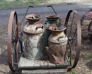 Rustic milk cans and milk can hand cart