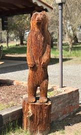 Carved standing bear