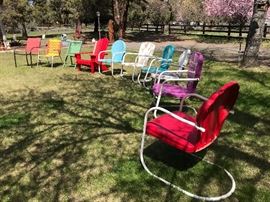 Several vintage metal chairs