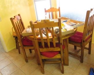 Table loaded with Kitchen Tools & Cutlery