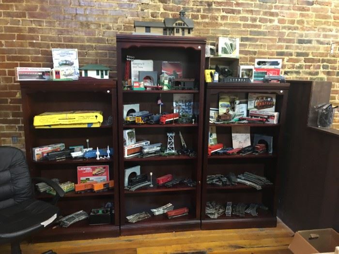 Large Lionel Trail Collection with really great accessories.  Selling as a set. Bookcases for display only.