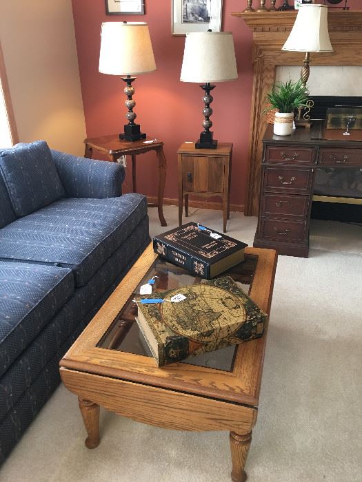 Oak dropleaf coffee table with glass (matching end table available); antique side table with marquetry top; small cupboard/side table; table lamps