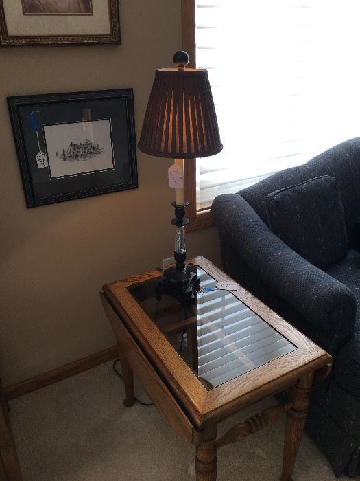 Oak dropleaf end table with glass (matching coffee table available), table lamp, framed art