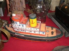 Neptune lithographed tin tug boat battery operated toy