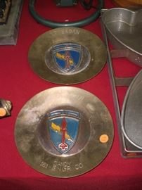 pair brass Korean war plaques