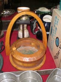 folk art wood carving of the Gateway Arch and the old Busch stadium