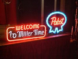 several neon beer signs