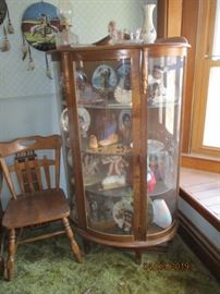 china cabinet with native american items