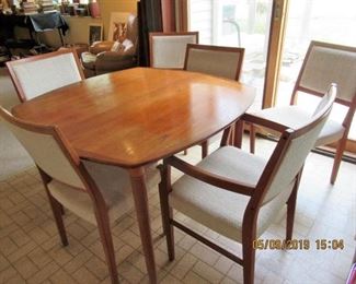 TEAK DINING SUITE 6 CHAIRS AND 2 EXTENSIONS BY SVEGARD MADE IN SWEDEN 42X.42. EXT ARE 18X42