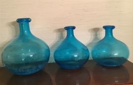 Beautiful matching three bottle turquoise blue. Can purchase as a set or individual.