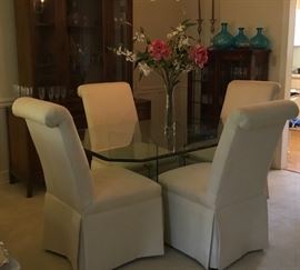 Beautiful  1970's Contemporary Beveled  Glass table top with Glass Double Pedestal, shown with Basset Linen Skirted Parson  Dining Room Chairs.  Like New! 