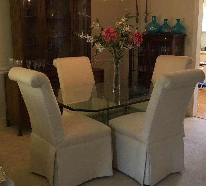 Beautiful 1970's Contemporary Beveled Glass table top with Glass Double Pedestal, shown with Basset Linen Skirted Parson Dining Room Chairs. Like New!