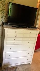 White Chest with straight lines and loads of storage.