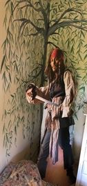 Lifesize cardboard cutout of actor Johnny Depp as Captain Jack Sparrow in Pirates of the Caribbean.
