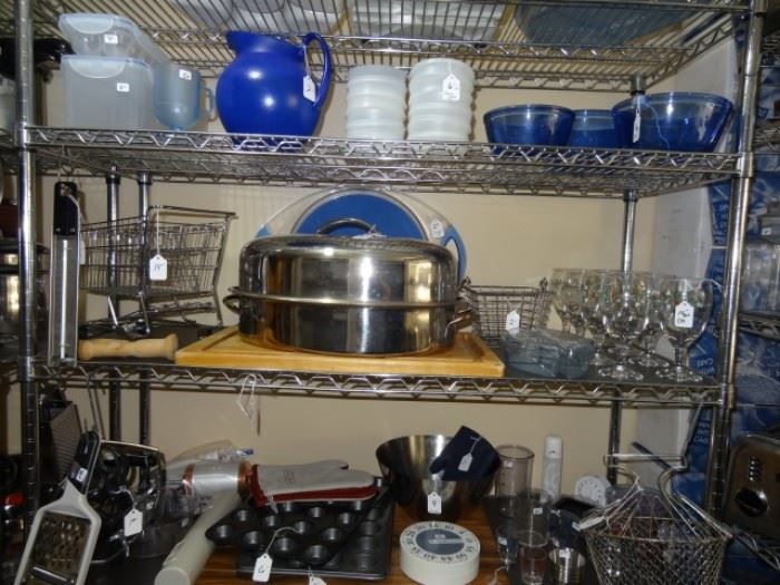 Stainless steel roaster Pyrex bowls Tupperware and baking items