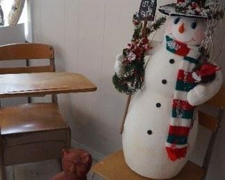 school desks with Snowman