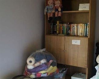 Bookcase (one of many), luggage, Raggedy Ann and Andy, videos, yarn