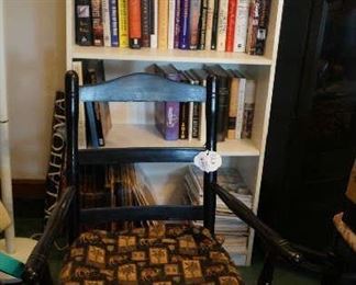 books, chair, bookcase (one of many)