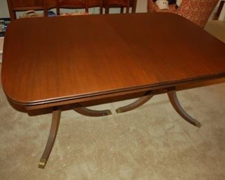 Two pedestal dining room table with 2 leafs, 40" x 61.5"