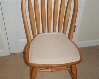 High curved back wooden chair