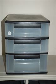Set of three plastic storage bins