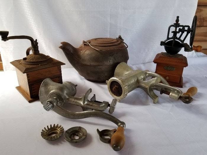 Vintage to antique cast iron kettle, coffee grinders, and meat grinders https://ctbids.com/#!/description/share/136920
