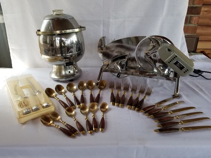 Vintage coffee pot, Rival slicer, brass and wood utensilsr set, and vintage carving set https://ctbids.com/#!/description/share/136921