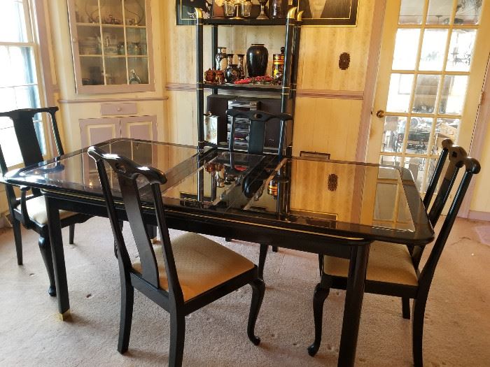 Large Black lacquer and mirror topped table with 4 chairs     https://ctbids.com/#!/description/share/136923