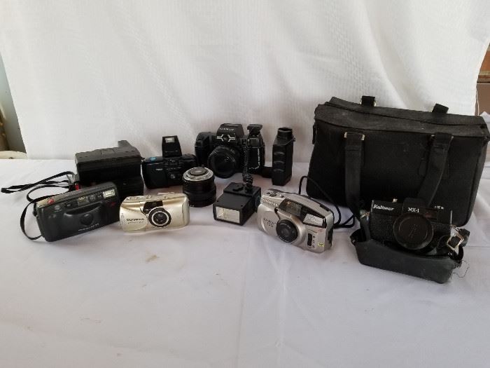 collection of various vintage and newer 35 mm cameras https://ctbids.com/#!/description/share/136930
